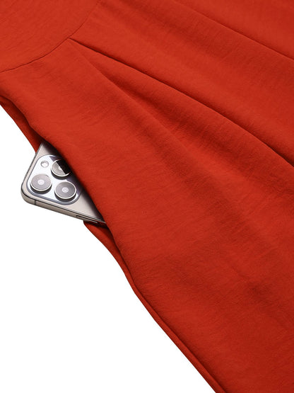 Combinaison rouge à col V jambes larges sans manches